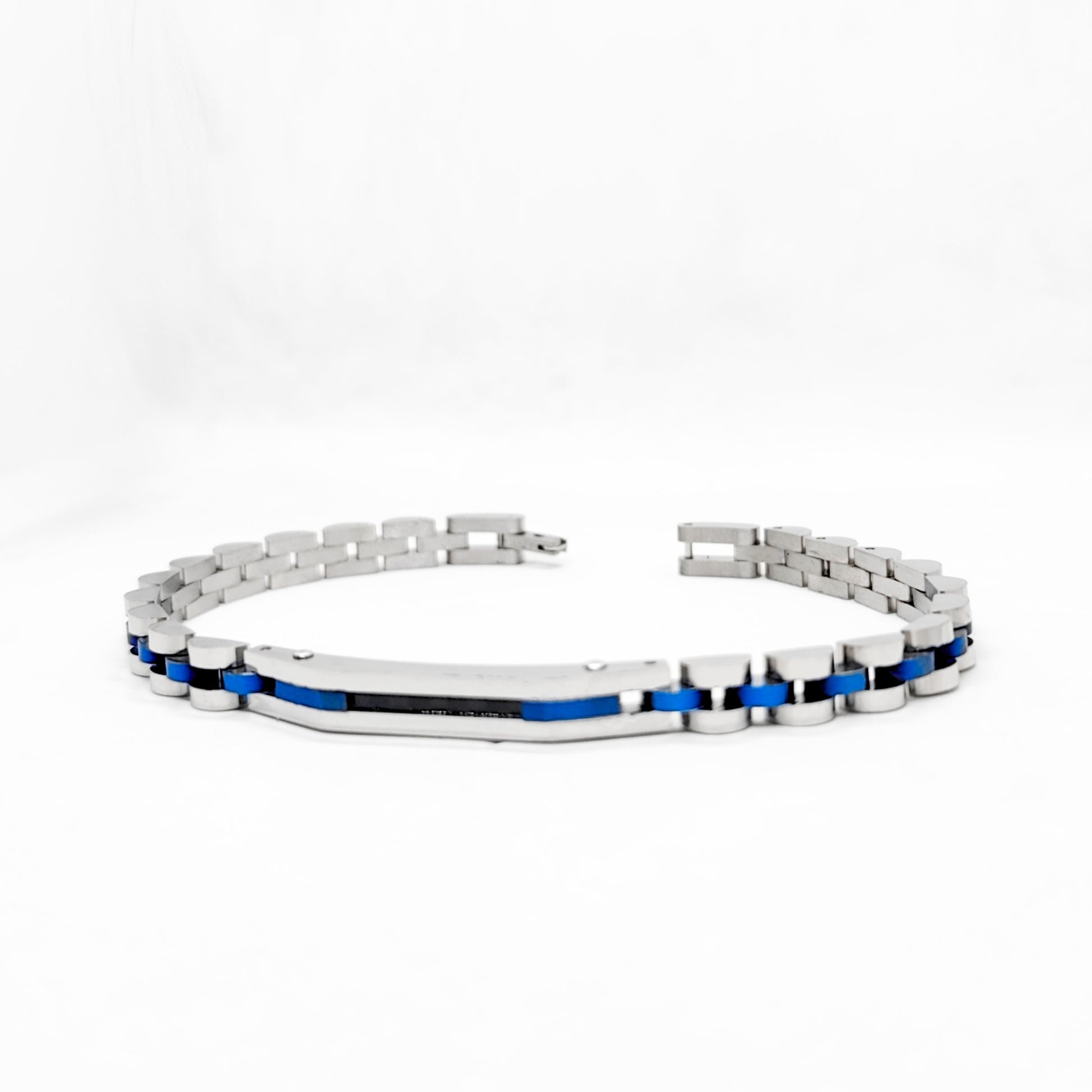 Silver stainless steel bracelet with blue accents and hinged clasp detail