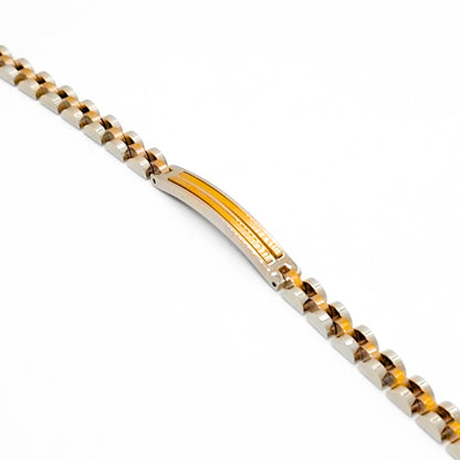 Close-up: gold and silver beaded link bracelet with amber enamel center stripe