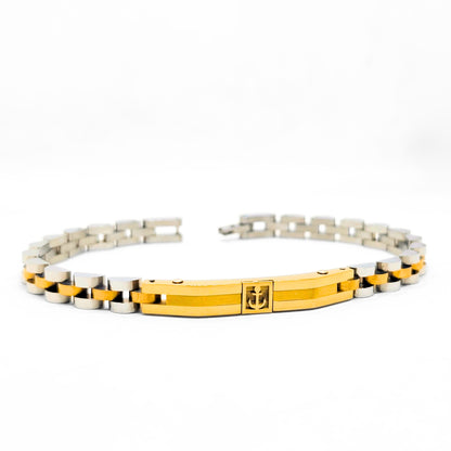 Two-tone anchor bracelet featuring a gold center bar with anchor emblem and silver links