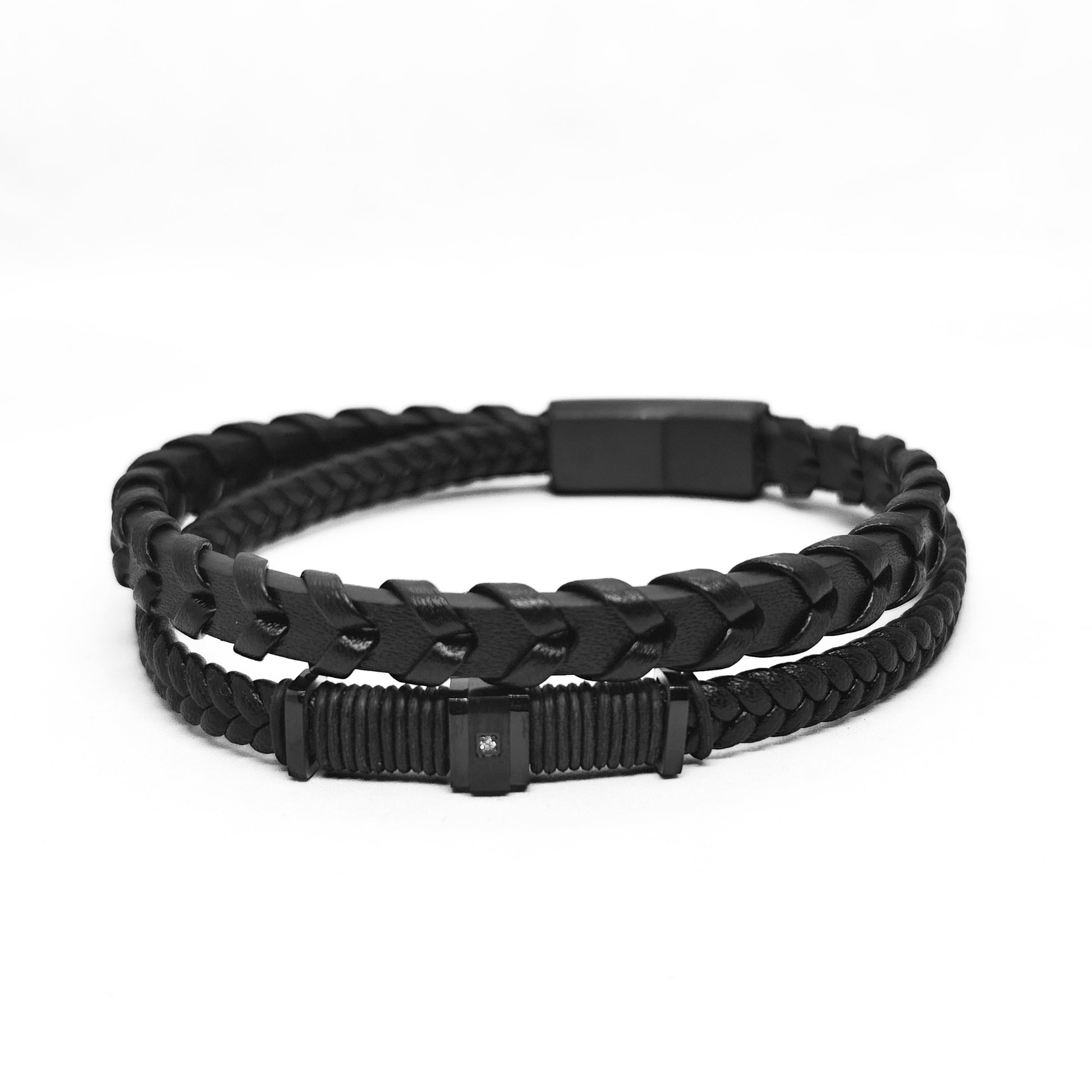 Men's black leather braided bracelet with micro-zircon detail near clasp