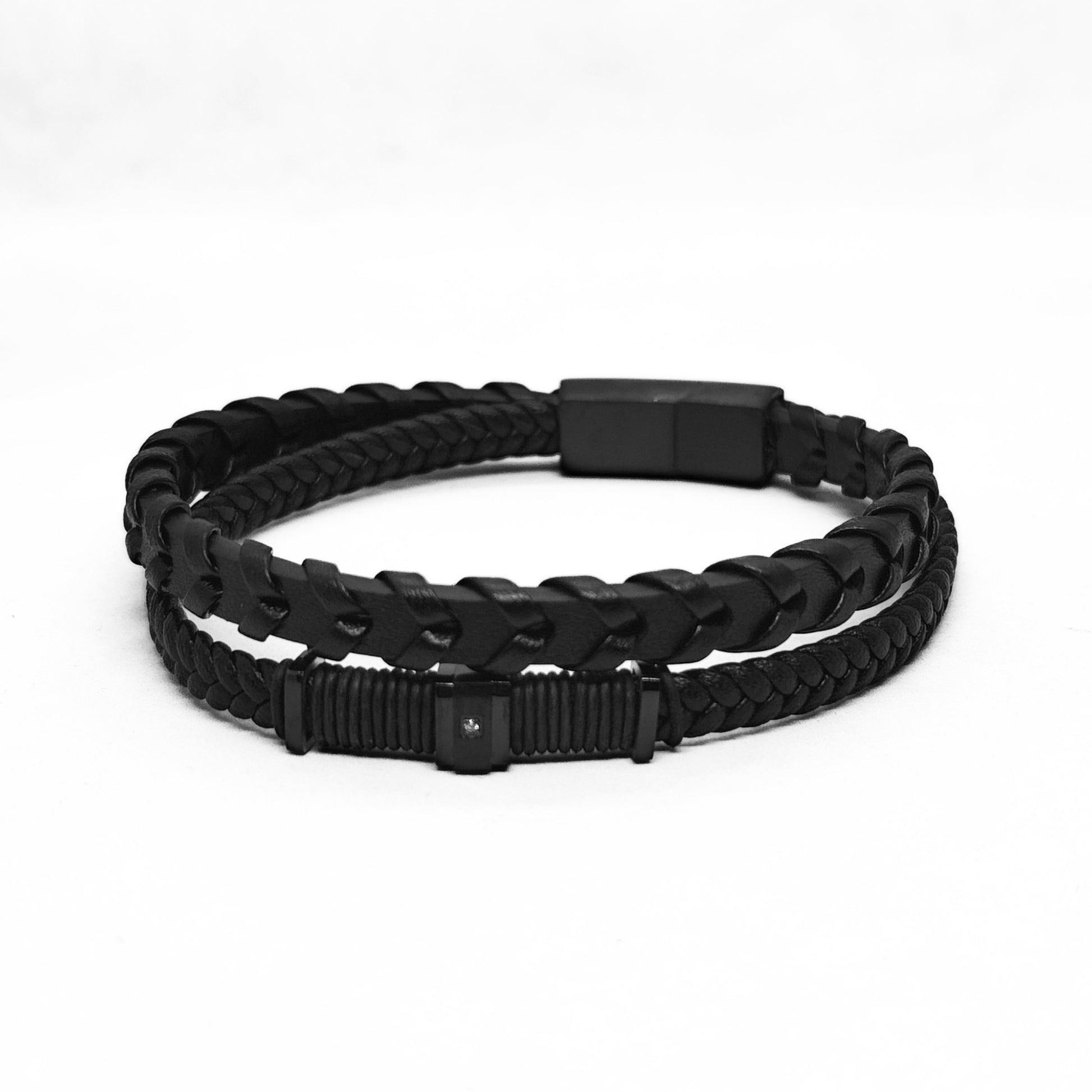 Men's black braided leather bracelet with rectangular clasp and braided texture
