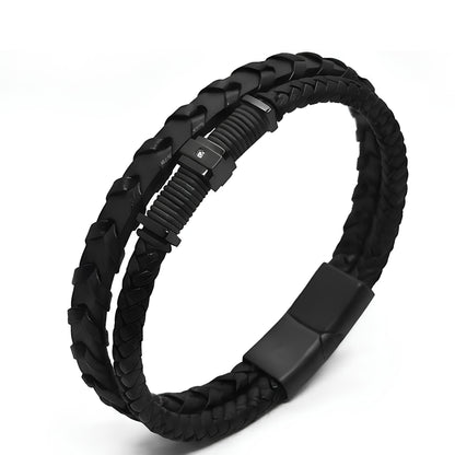 Men's black braided leather bracelet shown at angle with matte rectangular clasp