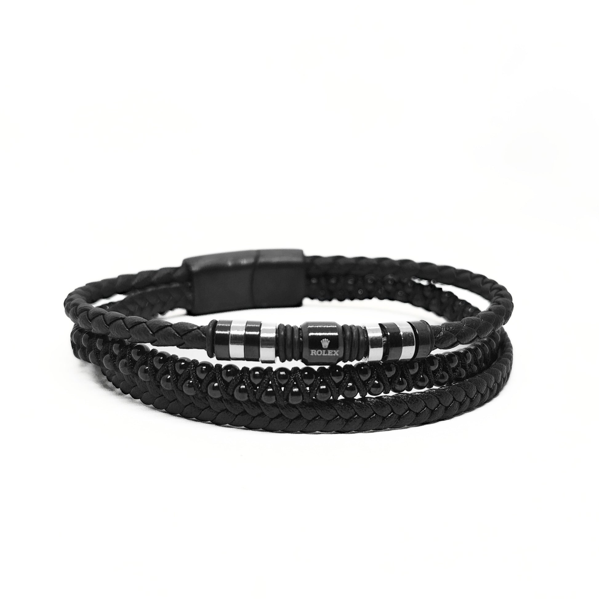 Men's black braided leather bracelet with striped metal bead center and multi-wrap design