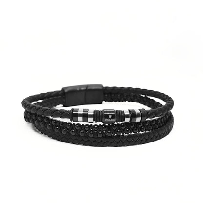 Men's black braided leather bracelet with striped metal bead center and multi-wrap design