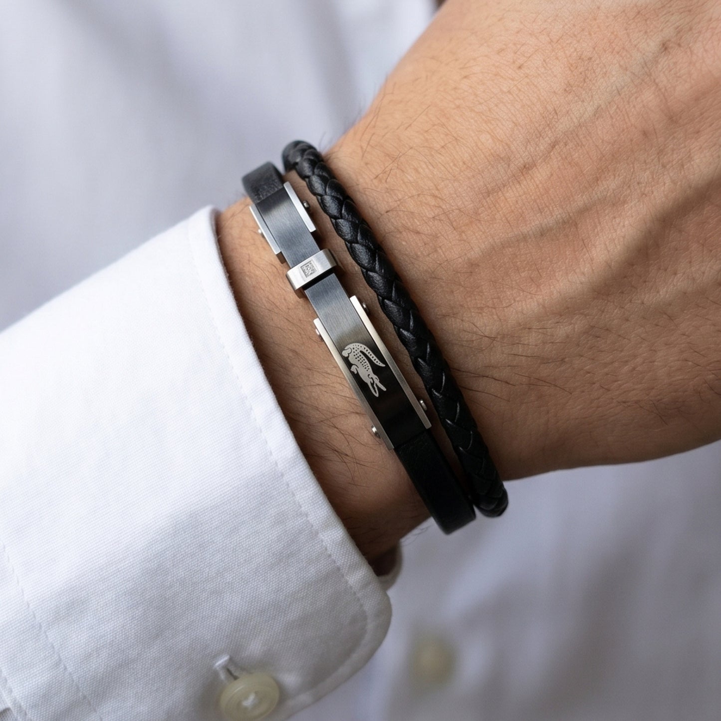 Premium Leather - B-143 Bracelet by Overpowered Accessories, featuring a sleek black braided design and metal accents on a wr