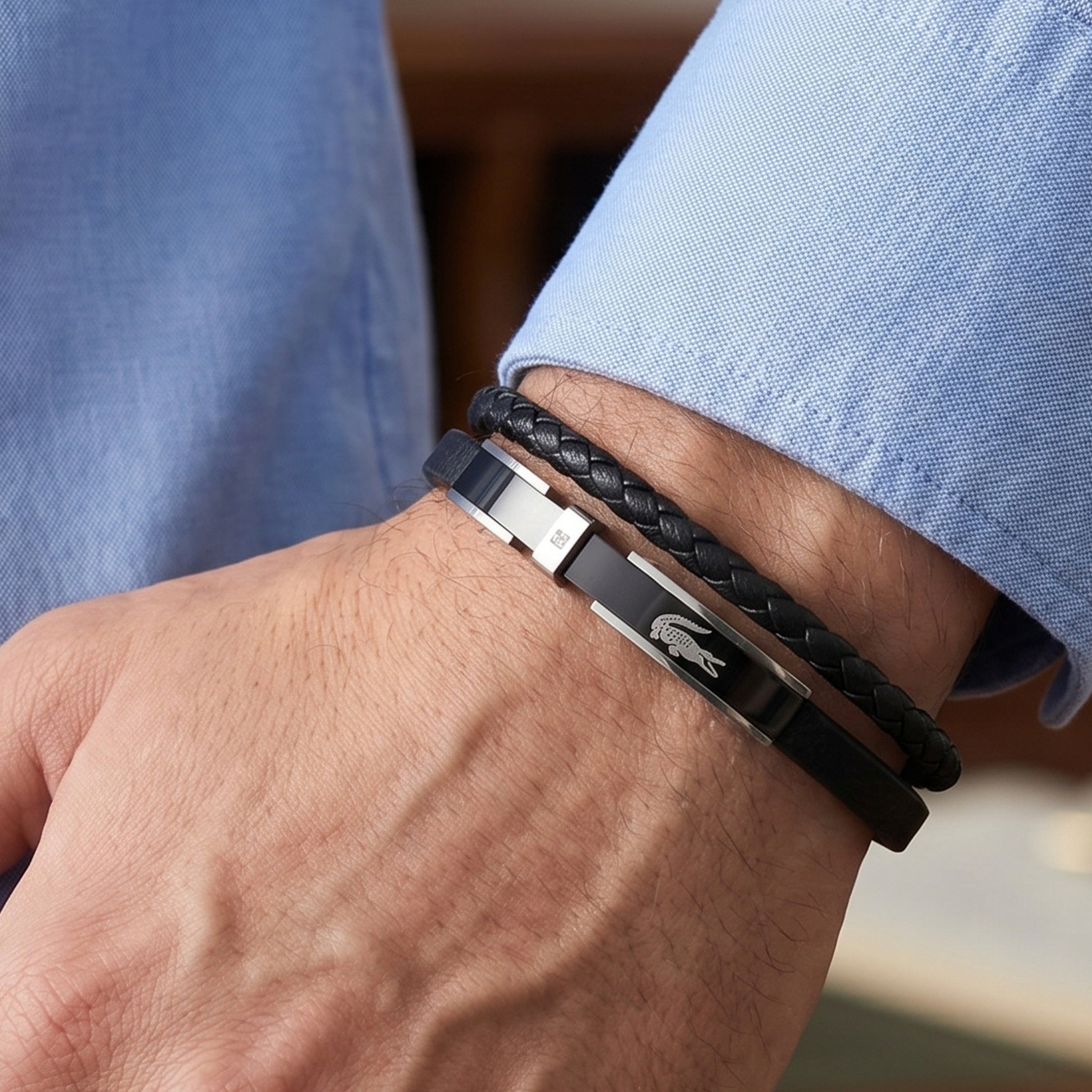 Premium Leather B-143 Bracelet from Overpowered Accessories, featuring a sleek design with a black braided strap and metal ac