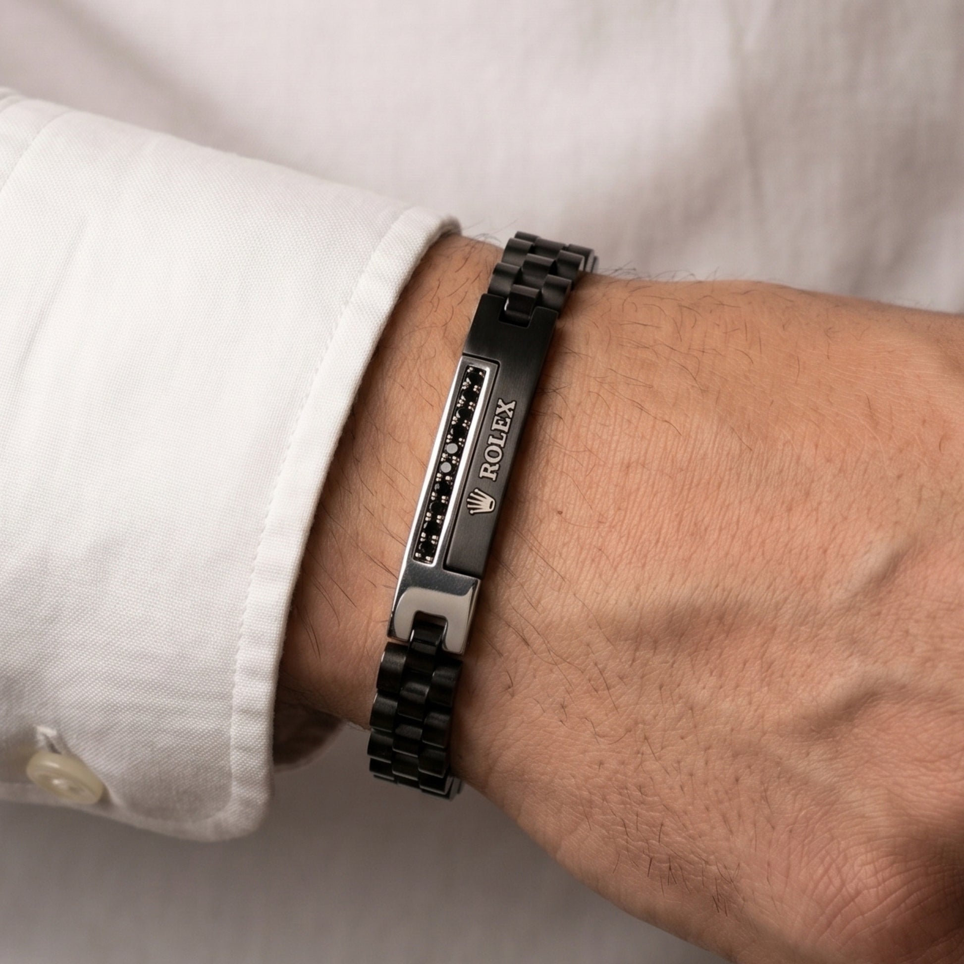 Silver and black stainless steel B-150 bracelet for men, featuring a sleek design and a polished finish.
