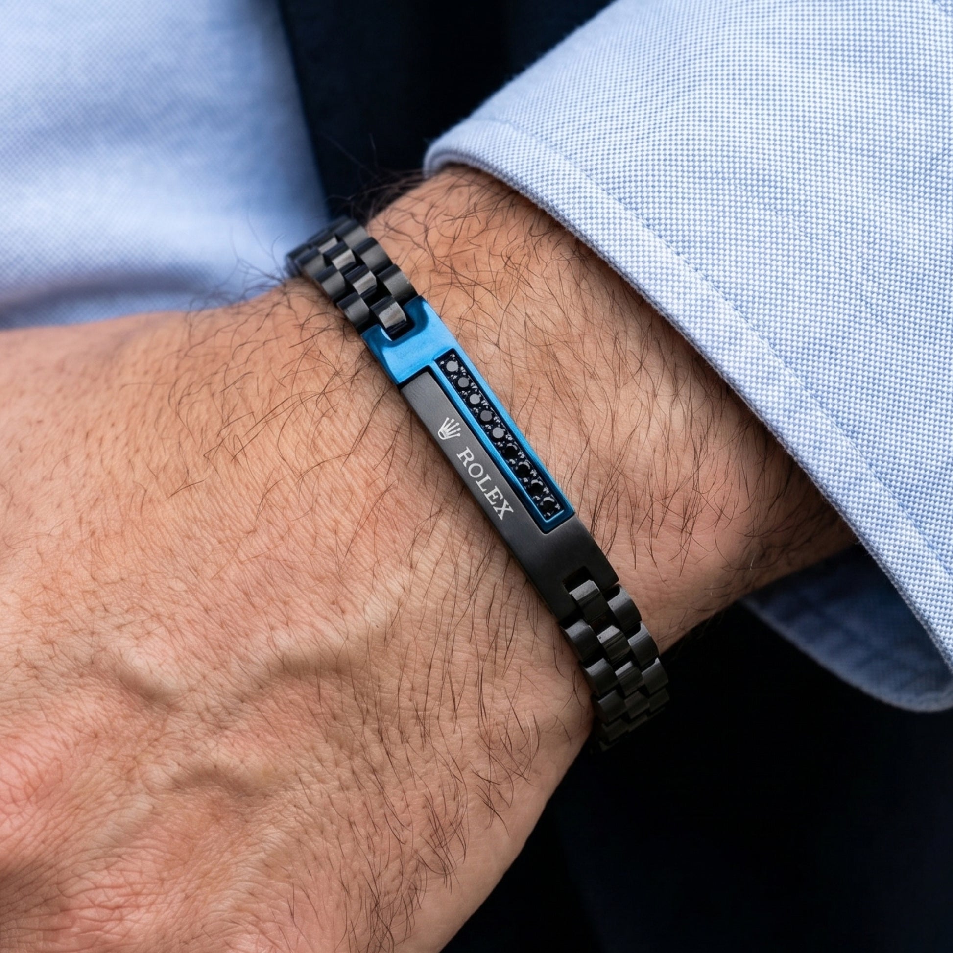 Blue and black stainless steel B-151 bracelet for men, featuring a sleek design and a modern clasp.
