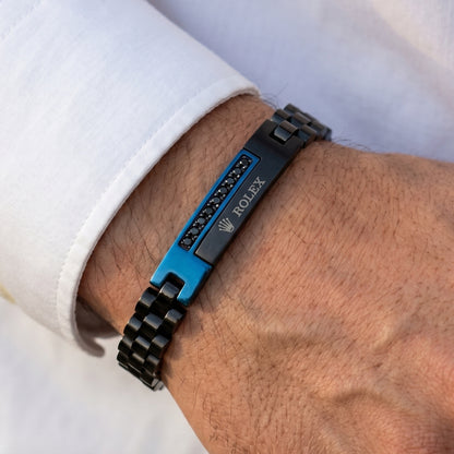 Blue and black stainless steel B-151 bracelet for men by Overpowered Accessories, featuring a sleek design and logo detail.