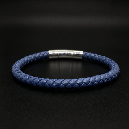 Dark blue braided leather bracelet with brushed silver band clasp