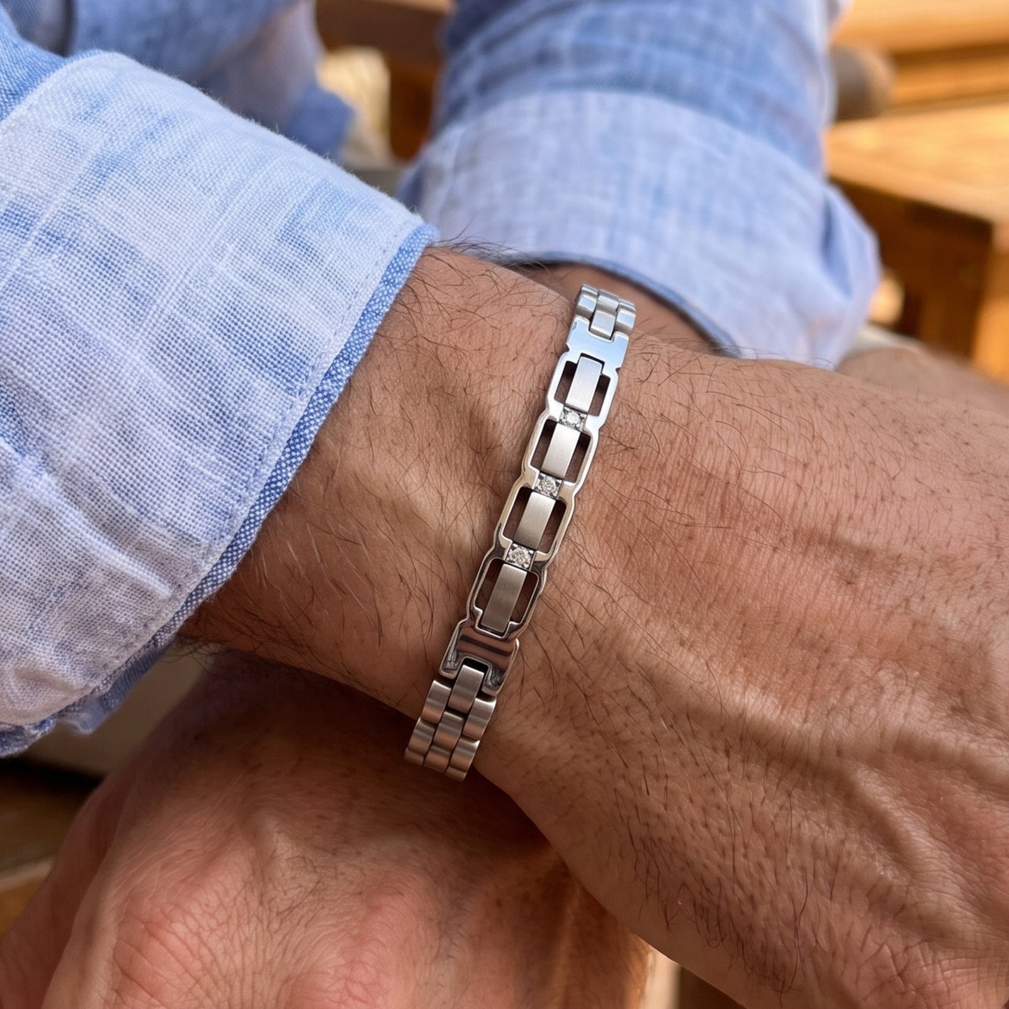 Silver stainless steel chain bracelet with alternating square zircon bezel links