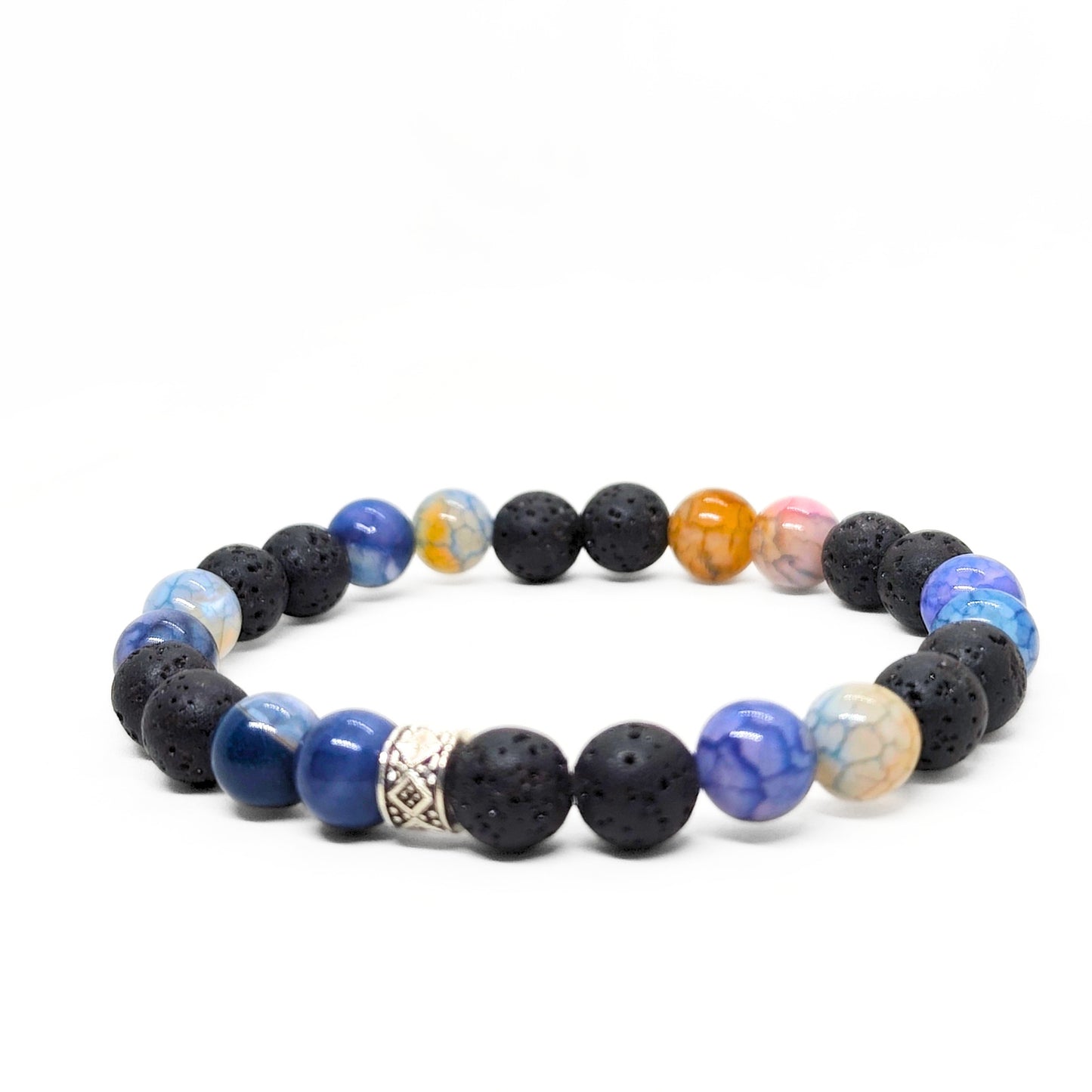 Men's beaded gemstone bracelet with black lava beads, blue stones, and silver geometric charm