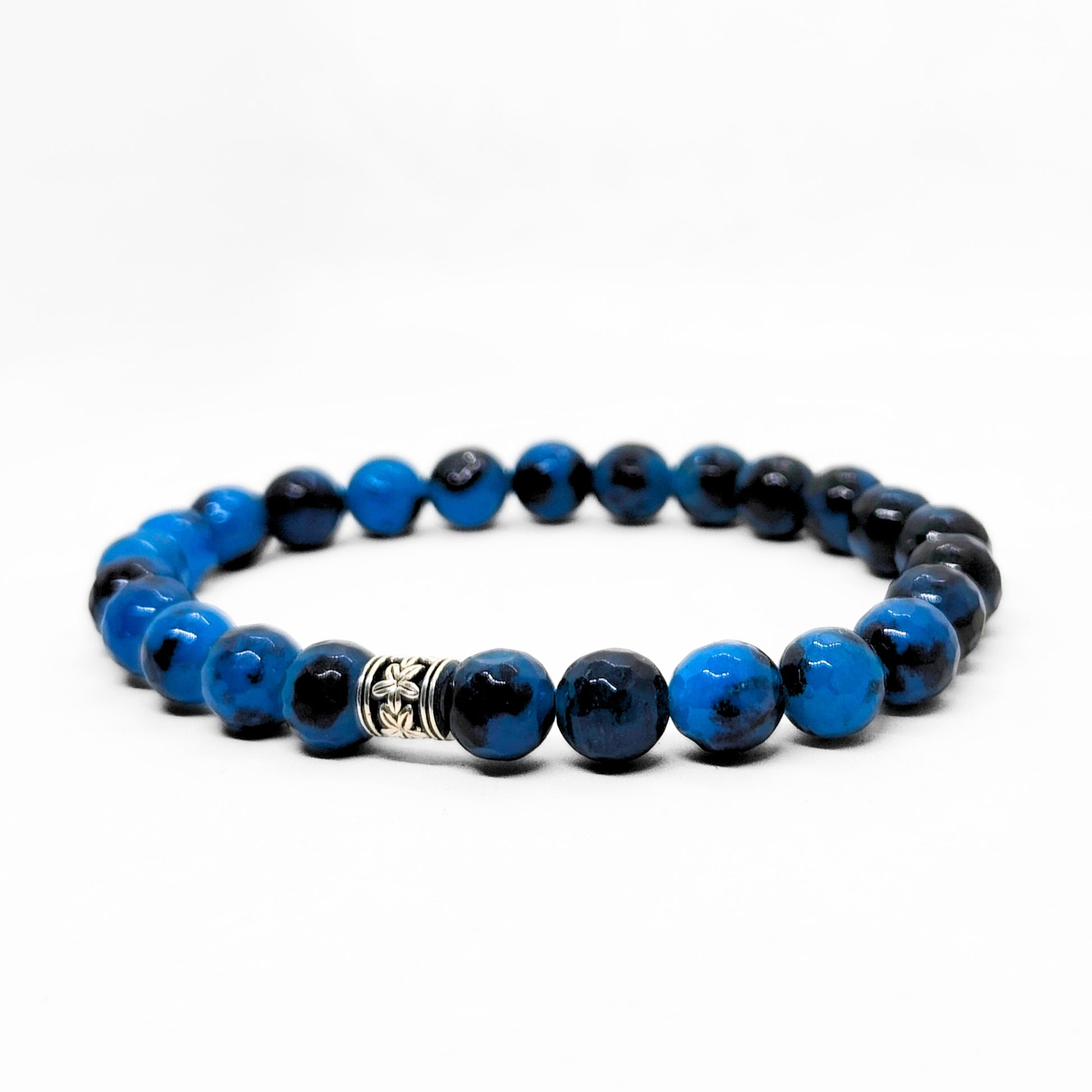 Men's blue and black beaded bracelet with ornate silver centerpiece