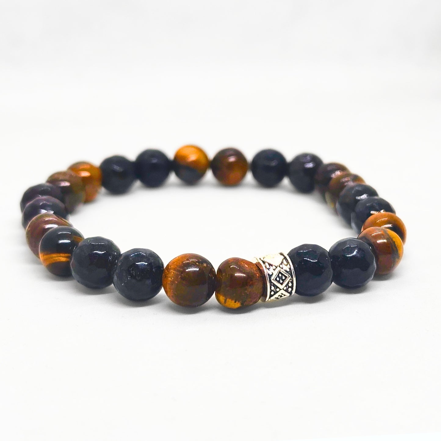 Mens beaded bracelet with dark navy round beads, amber tiger eye stones, and silver centerpiece