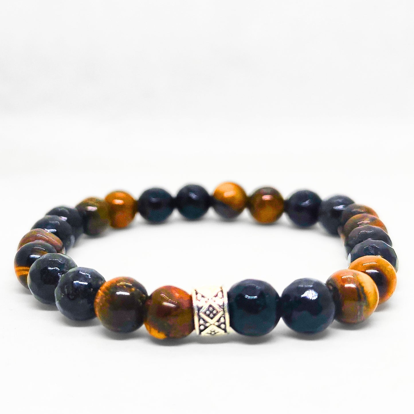 Mens beaded bracelet with dark navy and tiger eye orange-brown beads and silver charm centerpiece