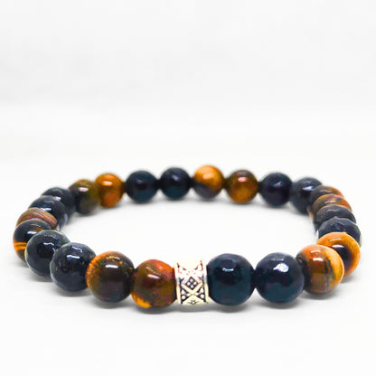 Mens beaded bracelet with dark navy and tiger eye orange-brown beads and silver charm centerpiece
