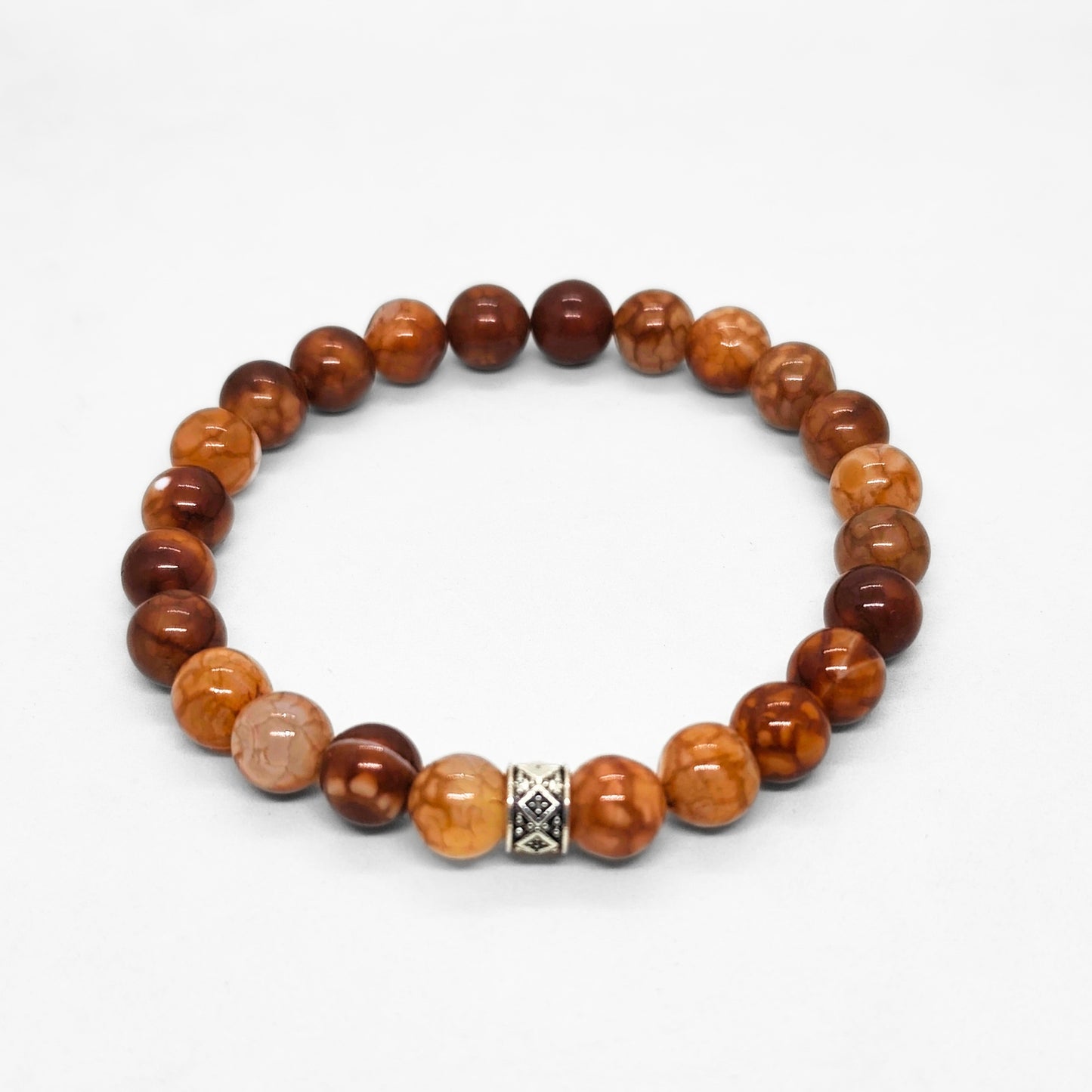 Men's brown gemstone bead bracelet with a silver patterned center charm