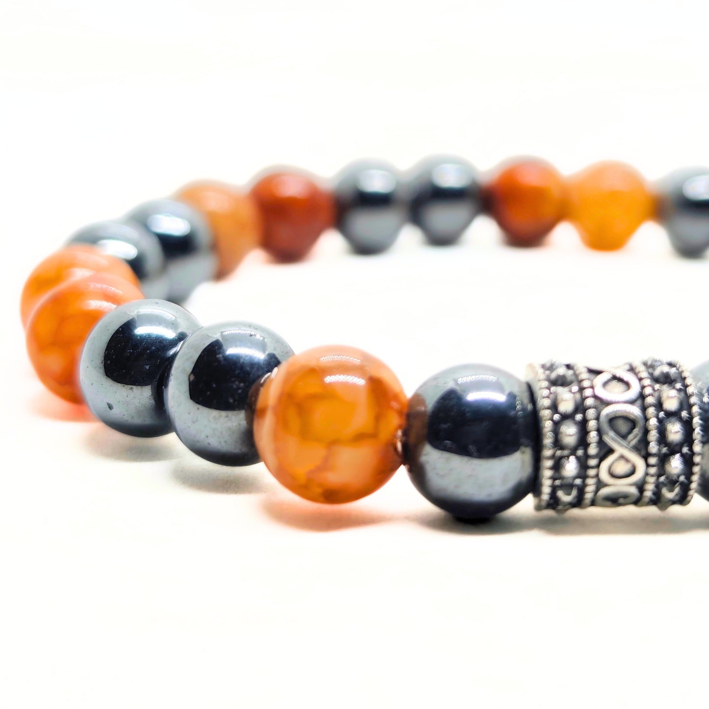 Natural Agate & Hematite G-20 Stone Bracelet featuring orange agate and gray hematite beads with a decorative silver spacer.