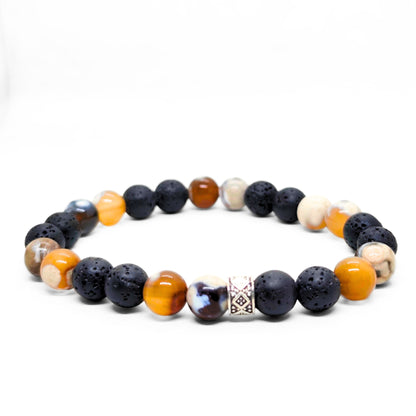 Men's beaded stone bracelet with black lava, orange beads, white agate, and patterned clasp bead
