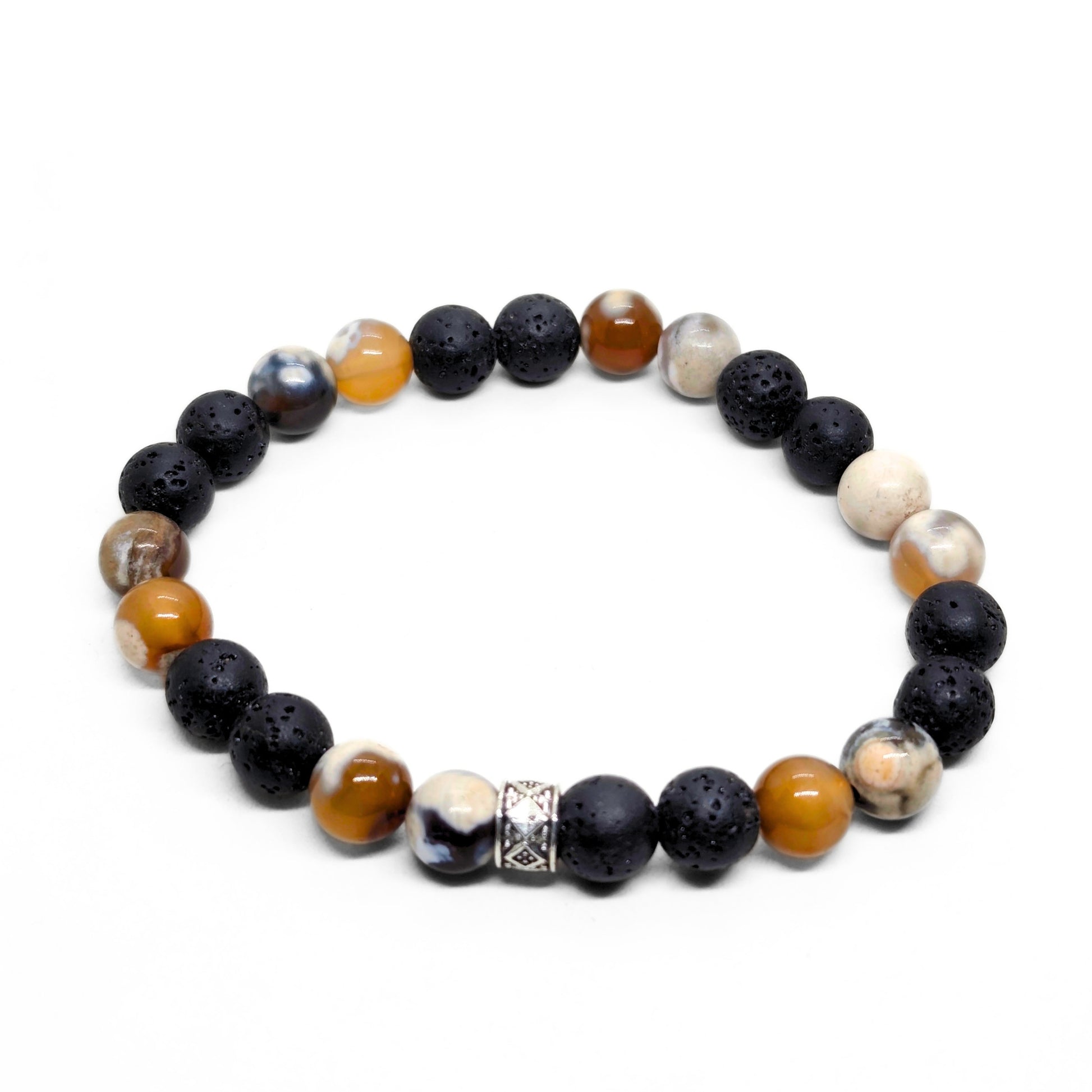 Stone bracelet with round black lava beads, orange and white agate, and patterned metal bead