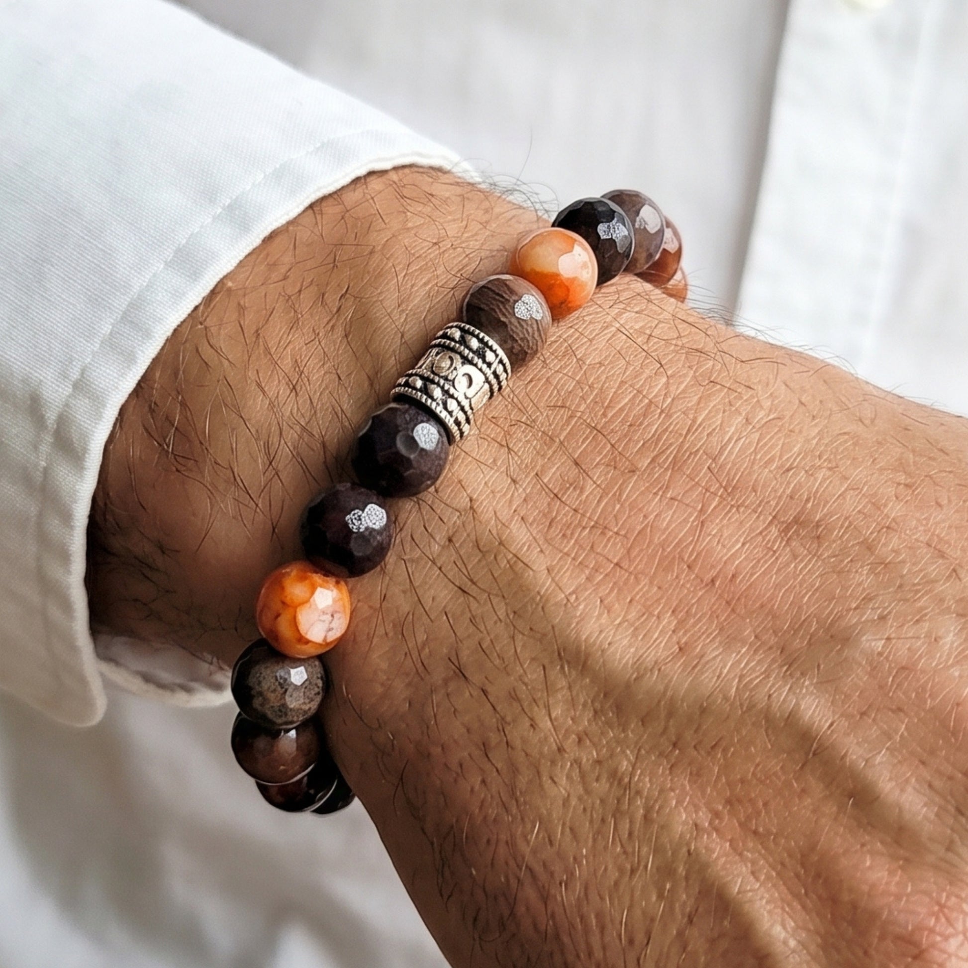 Natural Agate Stone G-26 Bracelet from Overpowered Accessories, featuring brown and orange beads with a decorative silver cen