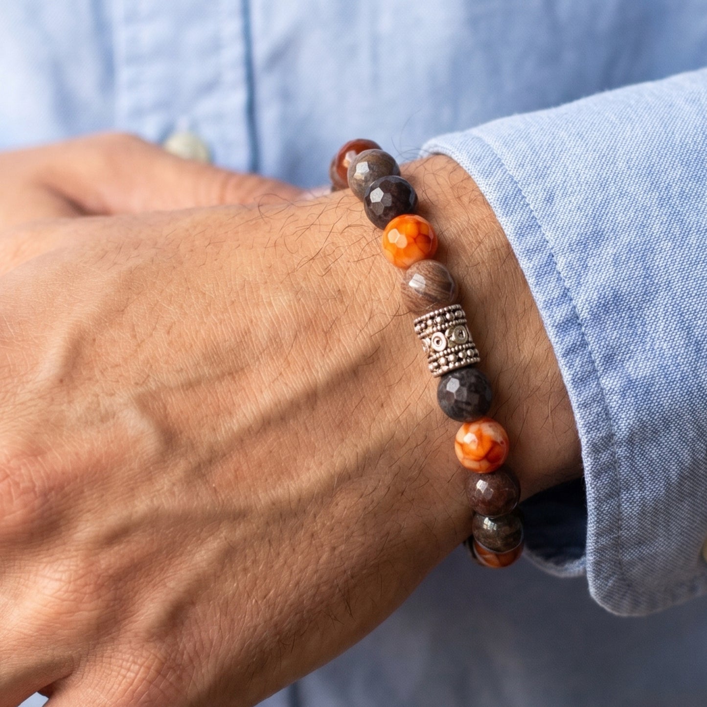 Natural Agate Stone - G-26 Bracelet features a mix of brown and orange beads with a decorative silver centerpiece, worn on a 