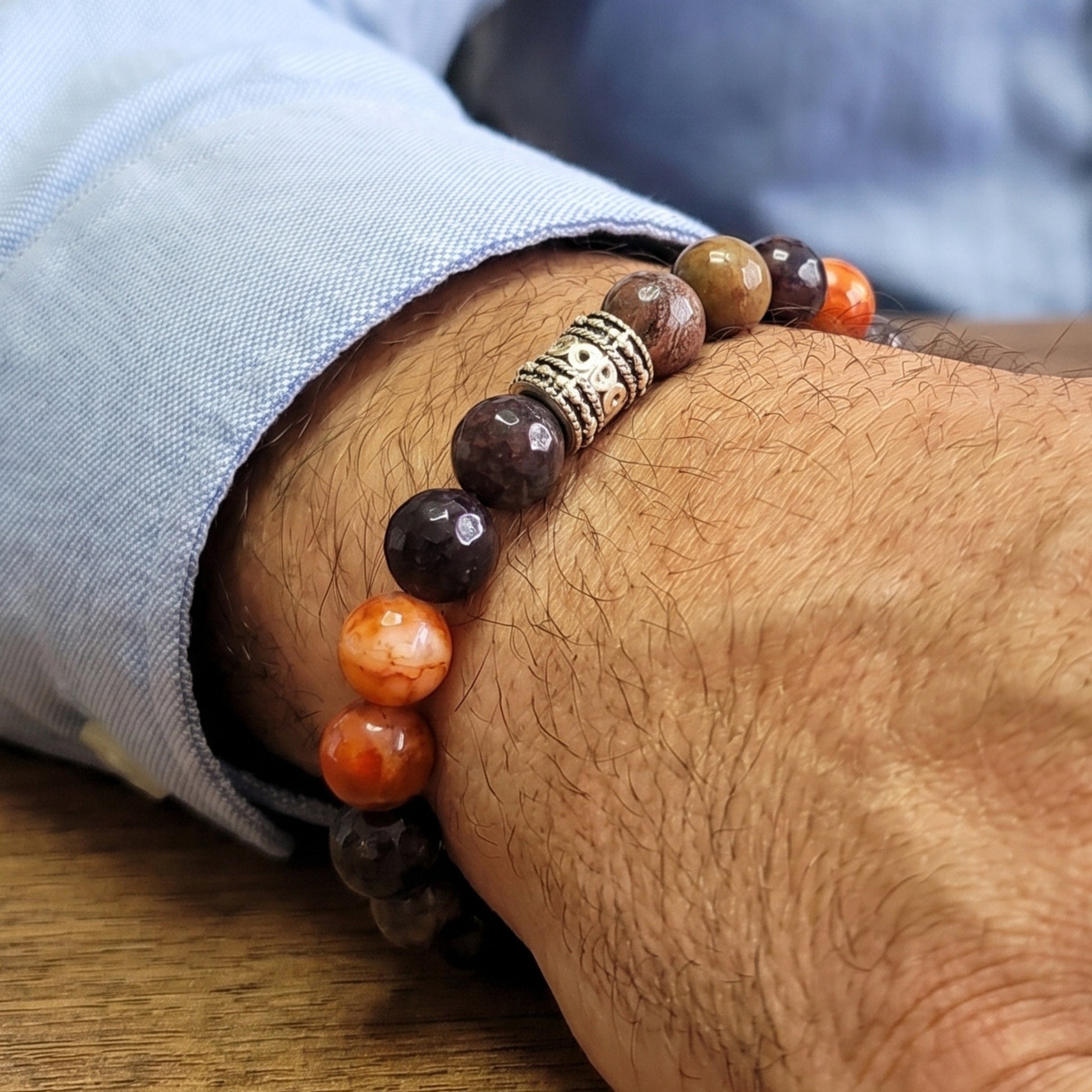 Natural Agate Stone G-26 Bracelet for men featuring colorful beads and a decorative silver accent on a wrist.