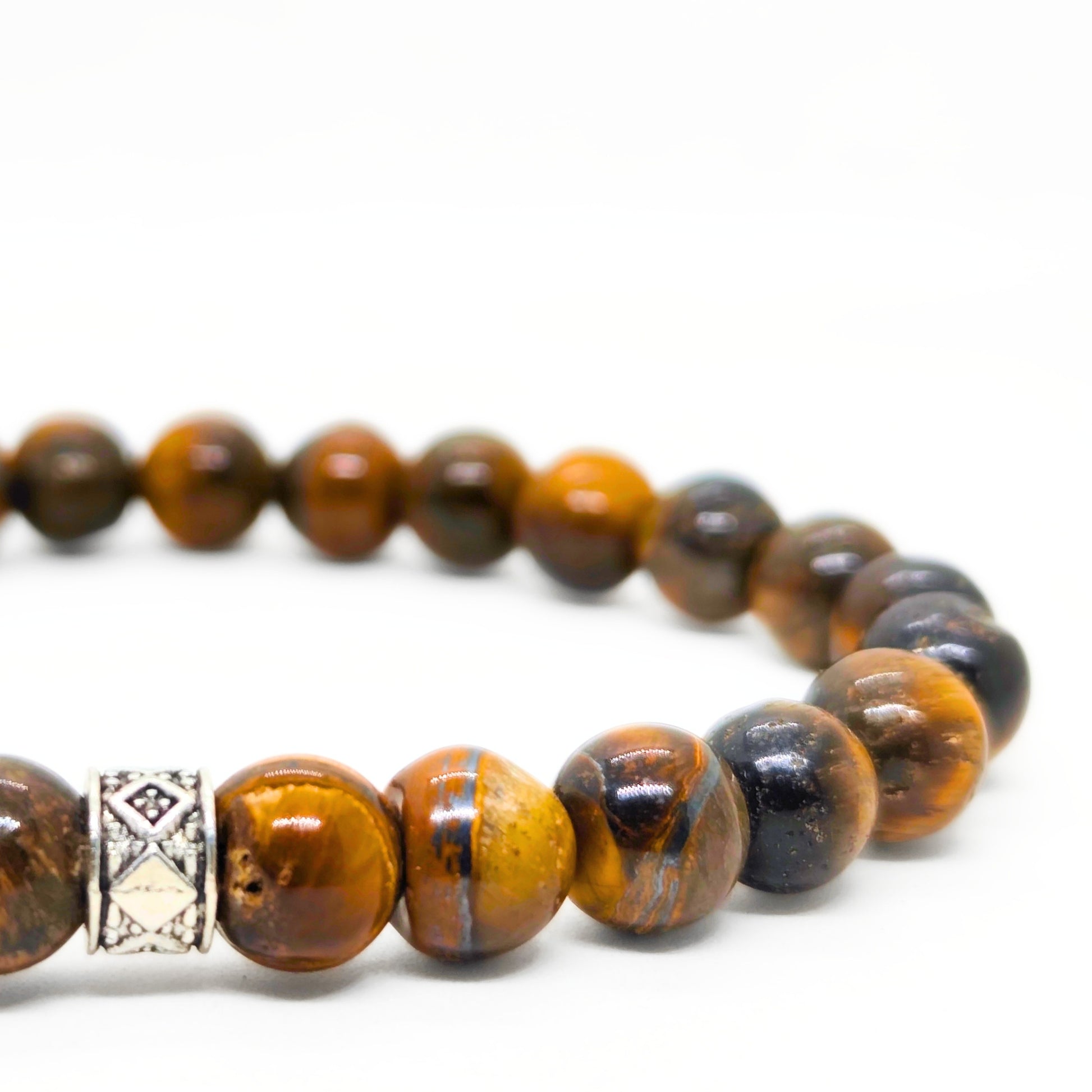 Men's bead bracelets set with tiger-eye and black lava rock beads, silver clasp accents