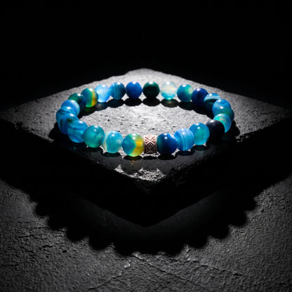 Men's beaded agate bracelet with blue and green round stones and small silver clasp