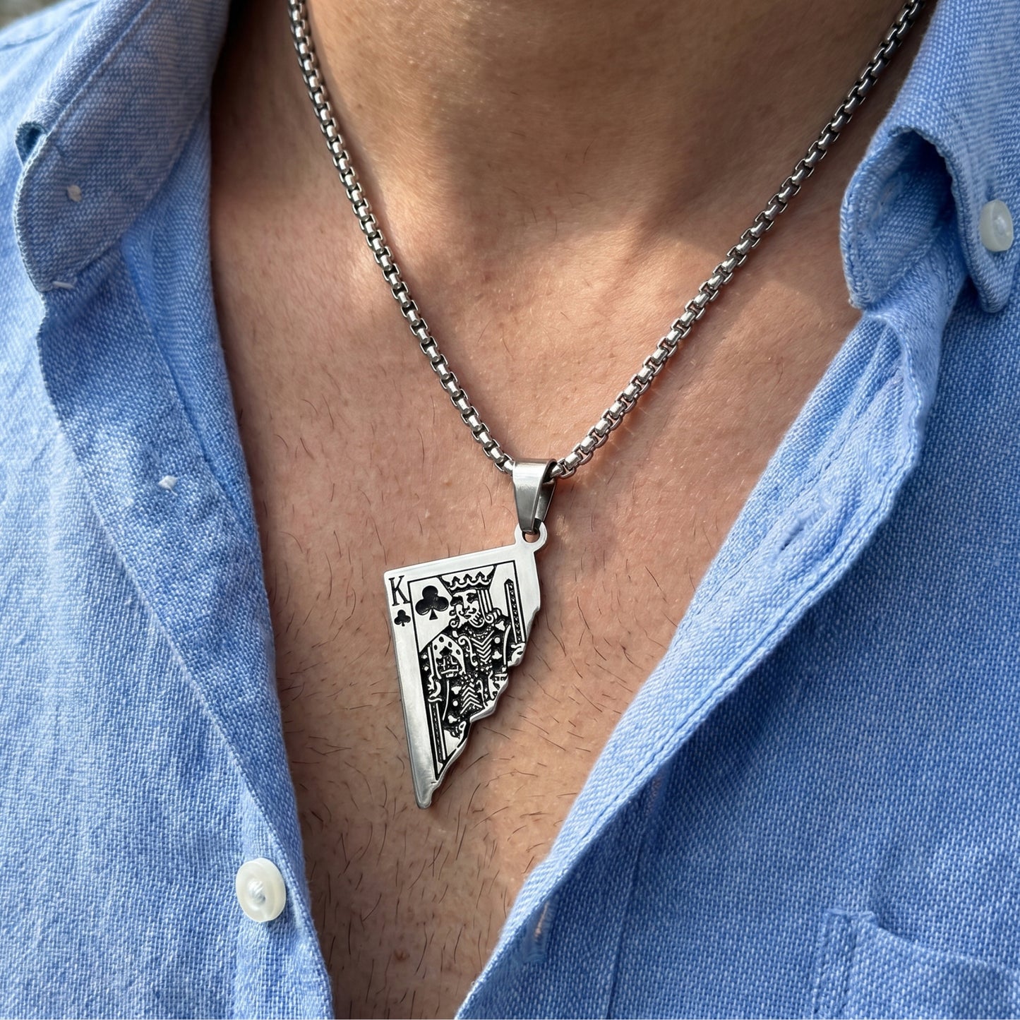Men's PN-009 King Card Pendant necklace by Overpowered Accessories, featuring a silver king card design on a chain.