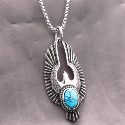 Silver eagle pendant necklace with turquoise oval cabochon stone and silver chain