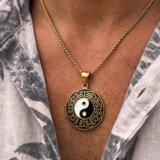 Gold yin-yang pendant necklace with round yin-yang charm on gold chain