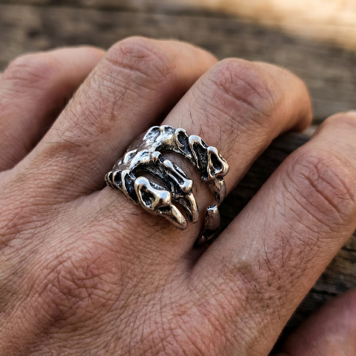 Ultra-Thin Zinc Alloy R-3 Ring by Overpowered Accessories, featuring a claw design worn on a hand.