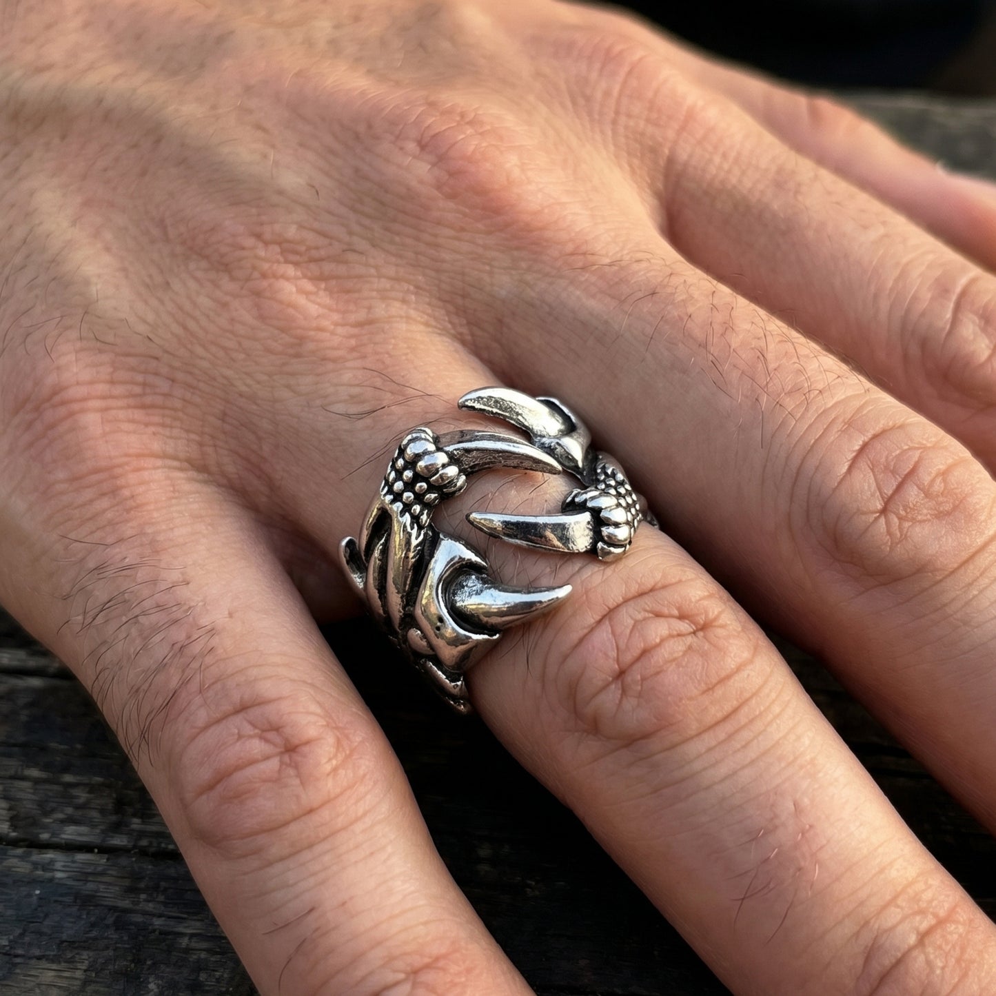 Ultra-Thin Zinc Alloy R-5 Ring by Overpowered Accessories, featuring a claw design on a man's hand.