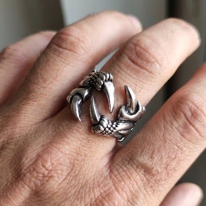 Ultra-Thin Zinc Alloy R-5 Ring by Overpowered Accessories featuring a claw design, worn on a finger.