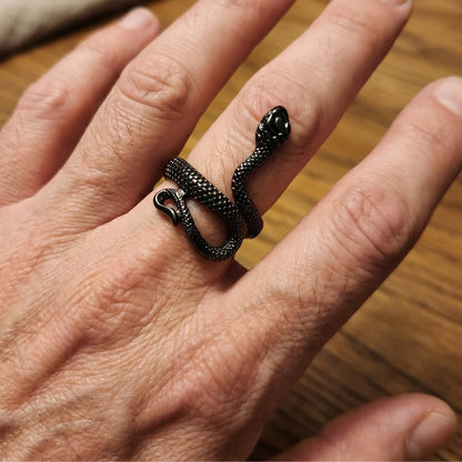 Bold Snake Design Zinc Alloy R-6 Ring by Overpowered Accessories, featuring a coiled snake design on a hand.