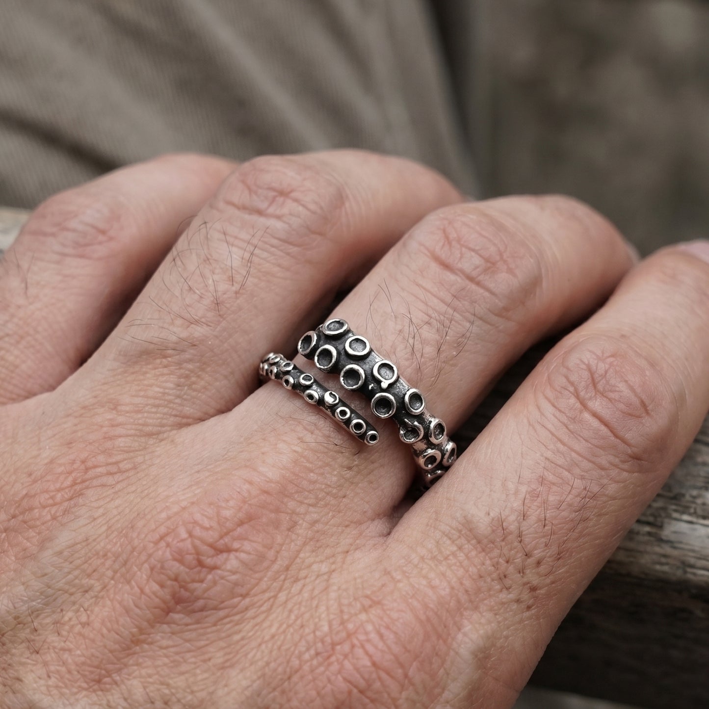 Bold Zinc Alloy - R-1 Ring by Overpowered Accessories shown on a hand, featuring a textured design with circular accents.