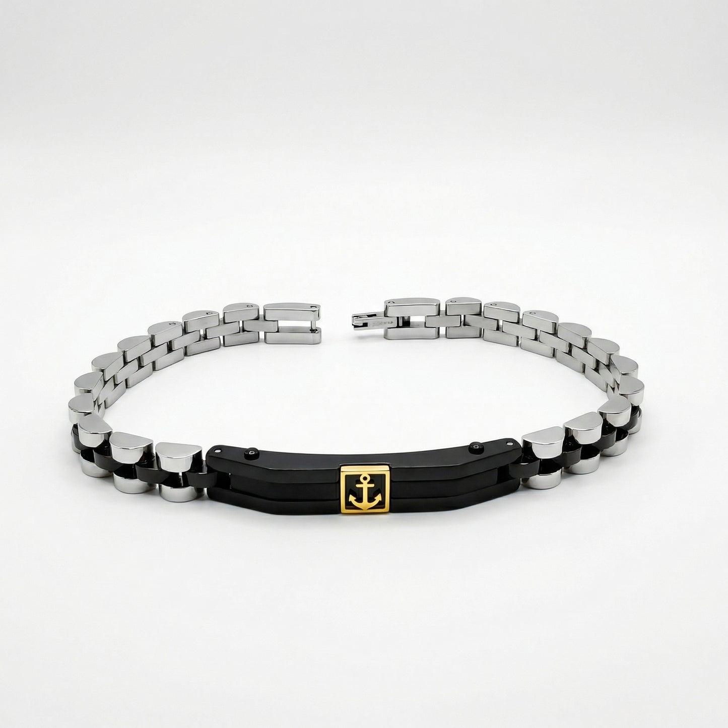 Two-tone silver and black stainless steel bracelet featuring a gold anchor charm, designed for men by Overpowered Accessories