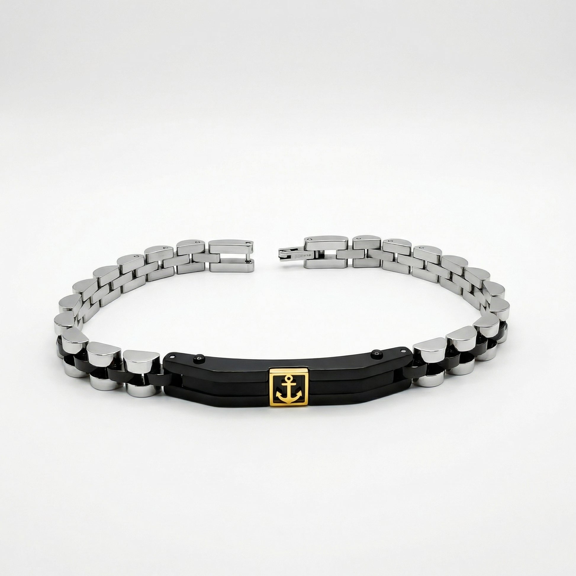 Two-tone silver and black stainless steel bracelet featuring a gold anchor charm, designed for men by Overpowered Accessories