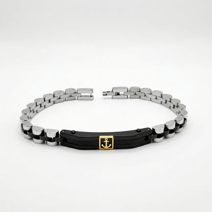 Two-tone silver and black stainless steel bracelet featuring a gold anchor charm, designed for men by Overpowered Accessories