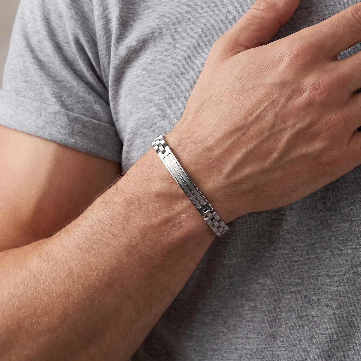 Silver stainless steel bracelet with hinged clasp and metal link bands