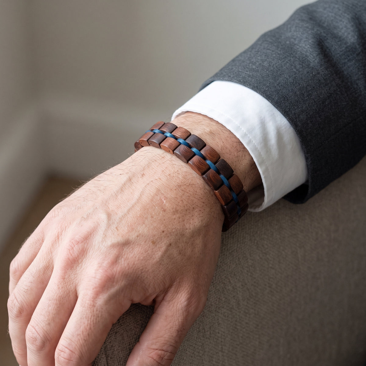 Men's adjustable rosewood bracelet with dark beads and blue braided detail, Overpowered Accessories