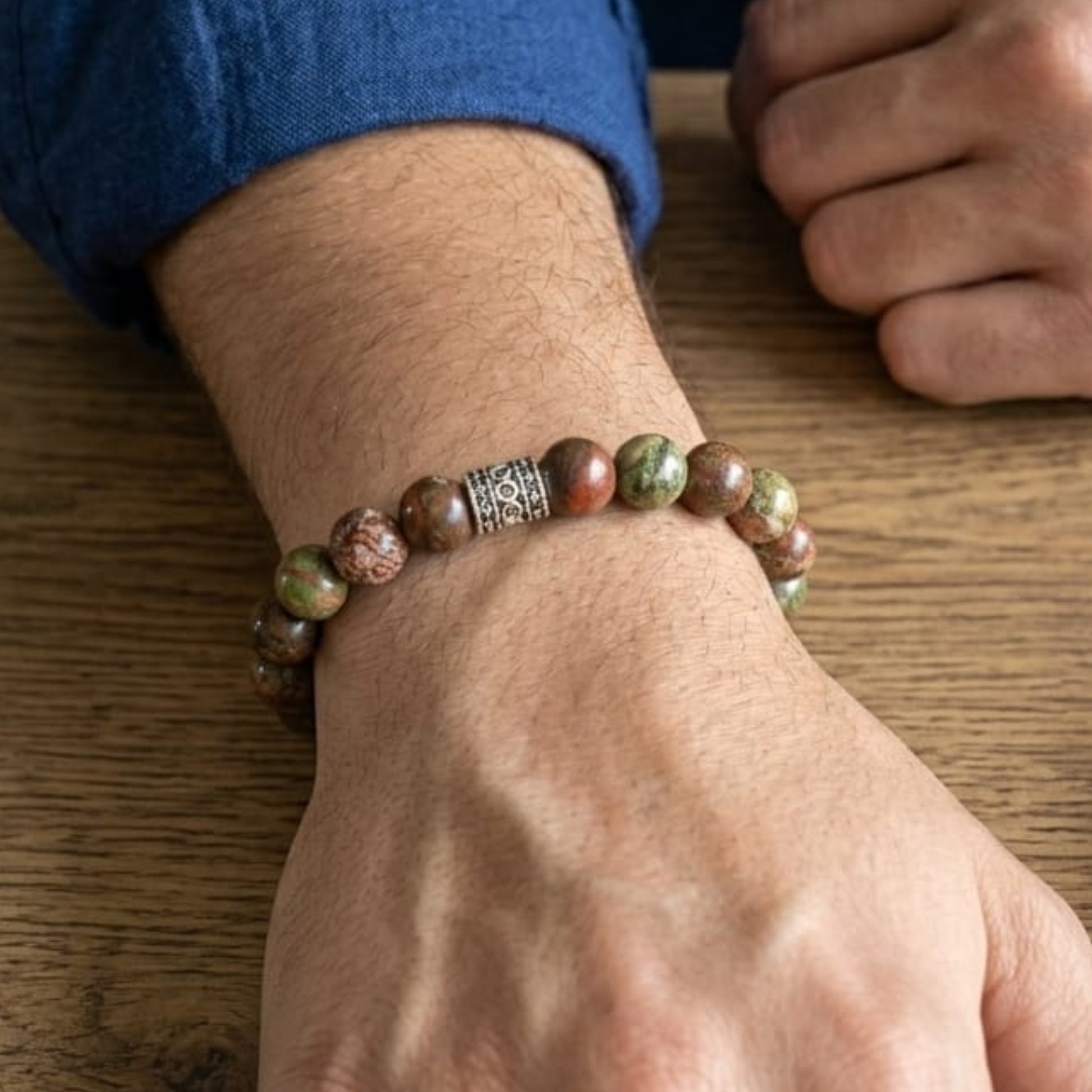 Men's Stone & Shade Bundle G-9 SG-001 featuring a beaded bracelet with earthy tones on a wrist.
