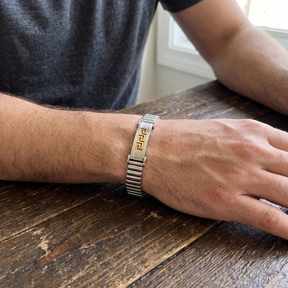 Men's adjustable stainless bracelet with gold Greek key insert and silver watch clasp