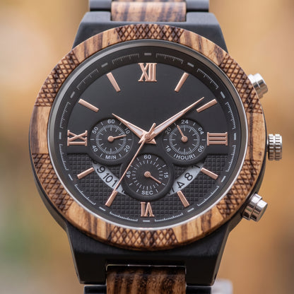 Men's zebrawood and ebony wood wristwatch close-up on wrist, black dial with subdials, Overpowered Accessories