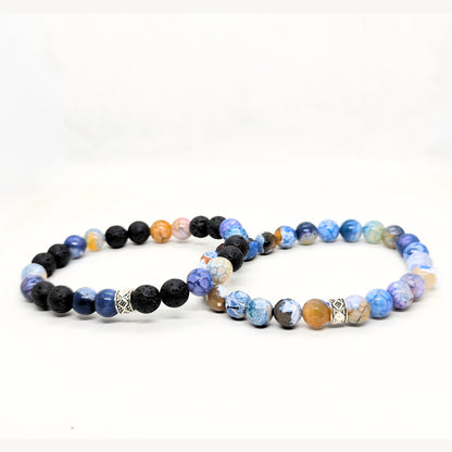 Men's stone bead bracelet set with blue, black, and earth-tone beads.