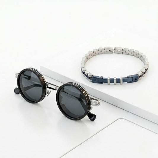 Men's round black sunglasses with silver hinges and blue beaded bracelet