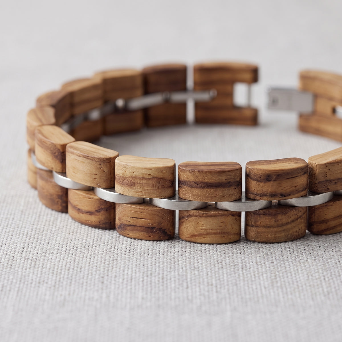 Natural zebrawood bracelet with alternating wood blocks and silver metal links, Overpowered Accessories