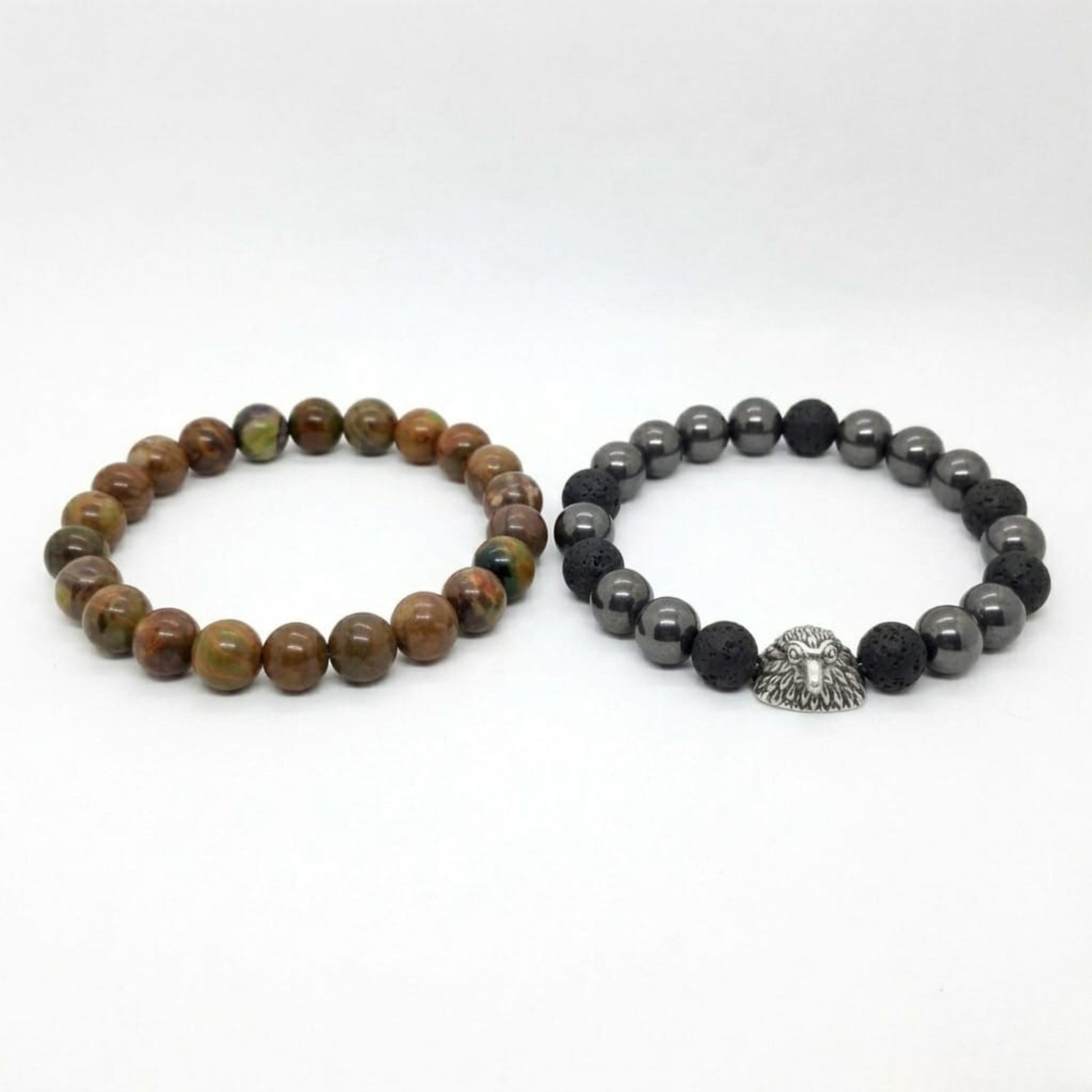 Men's Earthbound Sovereignty Bundle G-5 G-6 stone bracelets featuring earthy tones and a silver lion head charm.