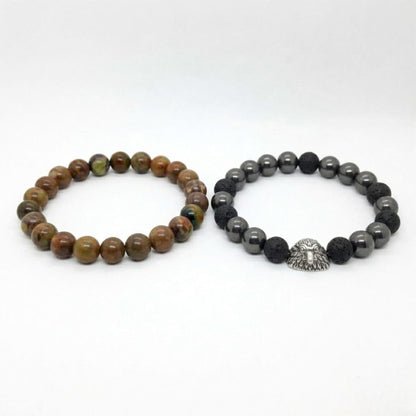 Men's Earthbound Sovereignty Bundle G-5 G-6 stone bracelets featuring earthy tones and a silver lion head charm.